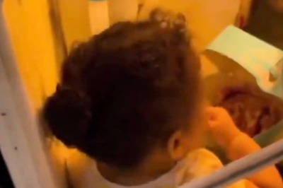 Internet Finds Video Of Little’s Girl Sneaking Into Fridge For A Treat 'Too Relatable'