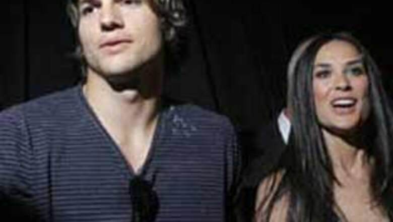 Ashton Kutcher posts semi-nude pics of wife Demi online