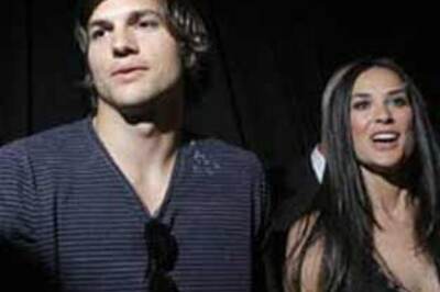 Ashton Kutcher posts semi-nude pics of wife Demi online