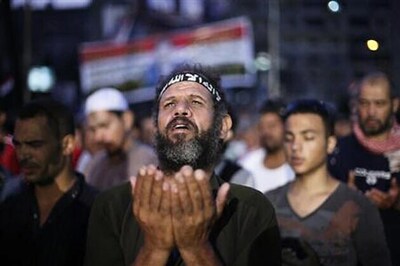 Egypt seeks quick elections, in shock at more bloodshed