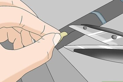 How to Sew a Button on Pants