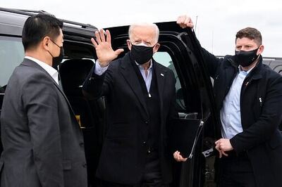 The Latest: Biden Committee To Join National Day Of Service