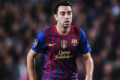 Barcelona's Xavi struggling with a hamstring strain