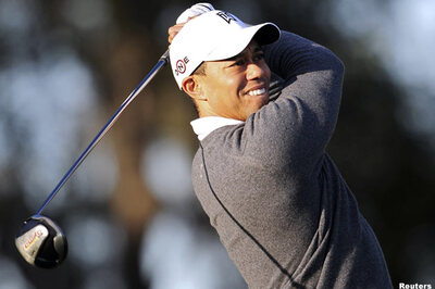 Woods close to his best at Boston TPC