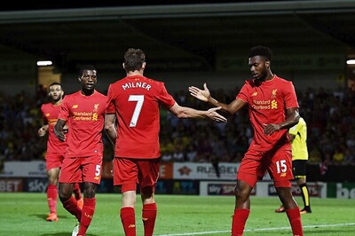 Liverpool Cruise, Chelsea Squeeze in League Cup