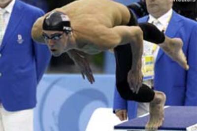 Phelps swims for record eighth gold at Olympics