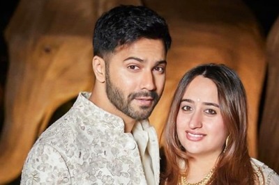 Varun Dhawan Cradles Natasha Dalal's Baby Bump In A Romantic Pic From Anant Ambani's Pre-Wedding Bash