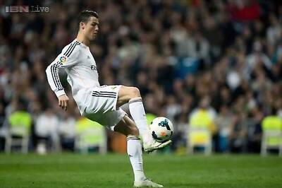 Injured Cristiano Ronaldo in doubt for Borussia Dortmund tie