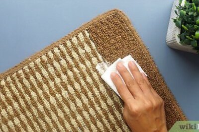 How to Get Adhesive out of Carpet