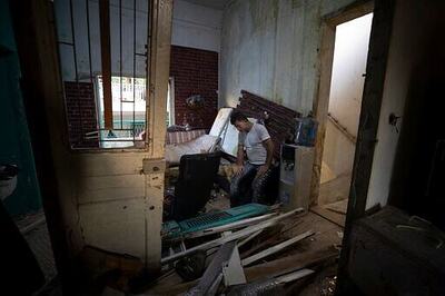AP PHOTOS: In flash, Beirut blast tore up thousands of homes
