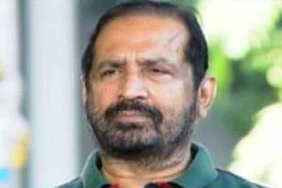 What awaits Kalmadi as he returns to India?