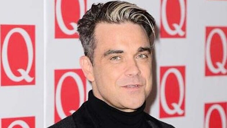 Robbie William slams Liam Gallagher for infidelity