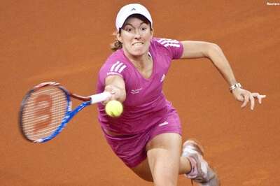 Henin edges past Sharapova at French Open
