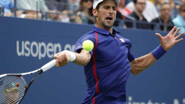 Djokovic eases through, Roddick delays retirement