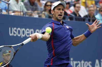 Djokovic eases through, Roddick delays retirement