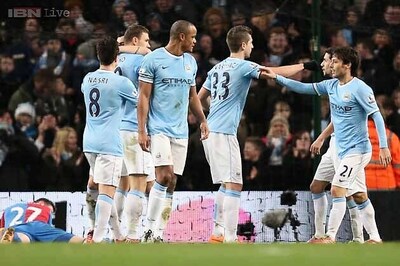 Dzeko rescues Man City in 1-0 win over Palace; Hull rout Fulham 6-0