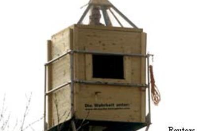 Wife's topless pic ends man's protest