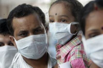 Swine flu toll rises to 21, PM says no need to panic