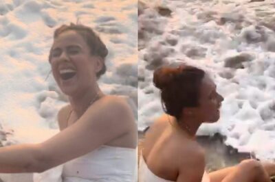 Nia Sharma Cracks Up As She Falls While Performing Cartwheel on Beach in White Monokini; Watch Video