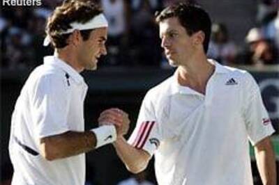 Federer beats Henman to win Japan Open