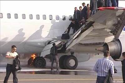 Plane catches fire during landing at airport in Moscow