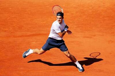 Jo-Wilfried Tsonga puts Roger Federer out of French Open