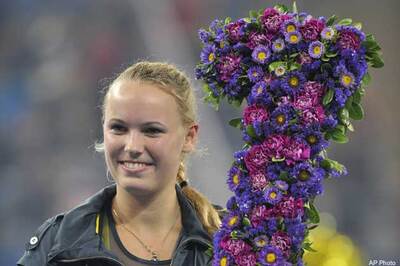 Wozniaki dethrones Serena as world No. 1