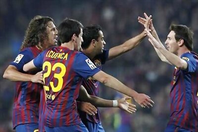 Messi extends Barcelona contract until 2018