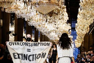 Climate Change Protester Disrupts Louis Vuitton Show in Paris