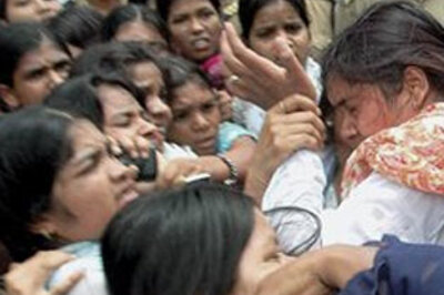 Teacher 'disrobes' girls