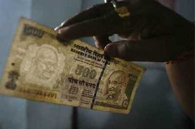 Rupee hits 5-month low, falls below 54 per $