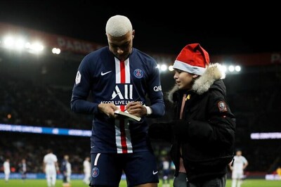 Kylian Mbappe Signs Autograph for Kid Who Ran Onto the Pitch Wearing Santa Claus Cap