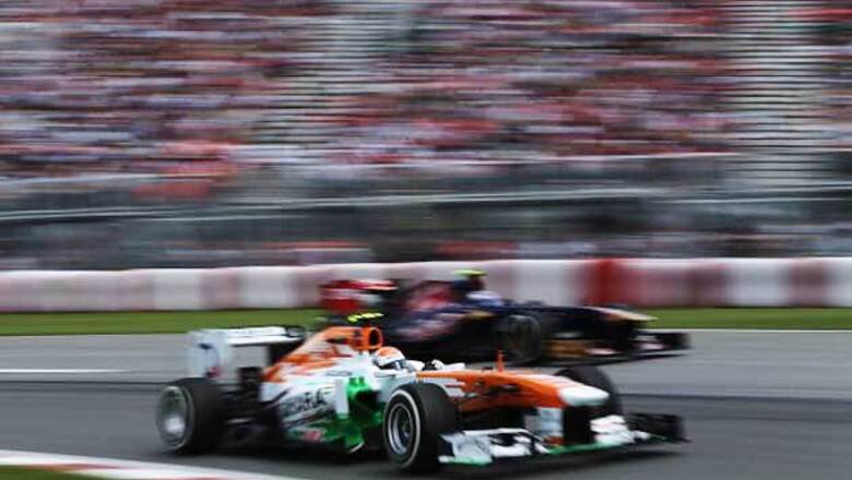 Force India's 100th GP earns them seven points