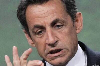 French court says Sarkozy overspent state funds in 2012 campaign