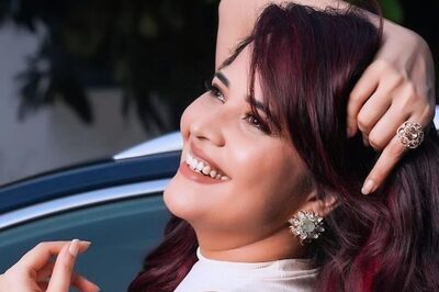 Anasuya Bharadwaj Slays Western Look In White High-neck Cut-sleeve Top And Blue Skirt