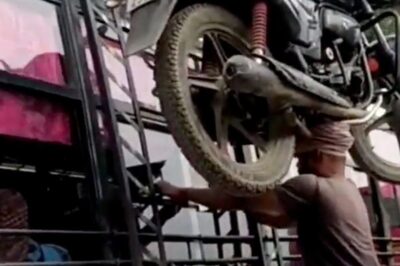 'Real Bahubali': Man Climbs Bus With Motorbike on His Head