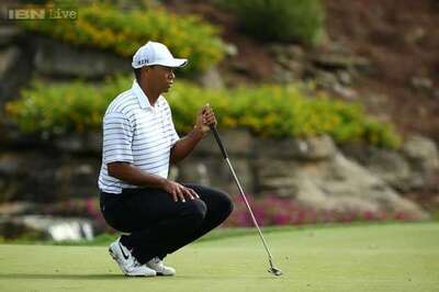 Ailing Tiger Woods soldiers on at Hero World Challenge