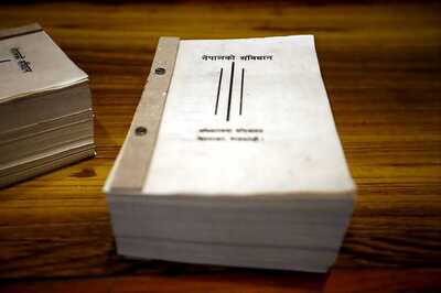 Nepal adopts democratic charter born of bloodshed, compromise