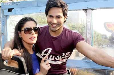 Chemistry or publicity stunt? Varun Dhawan sits on Nargis Fakhri's lap during 'Main Tera Hero' promotions