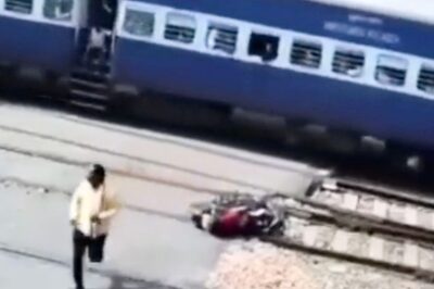 WATCH: Narrow Escape For Man as His Bike Stuck on Railway Track Gets Blown Into Pieces By Speeding Train