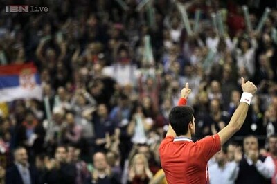 Djokovic levels Davis Cup final at 2-2