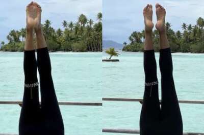 Actress Pooja Batra Aces Headstand Against Backdrop of Bora Bora