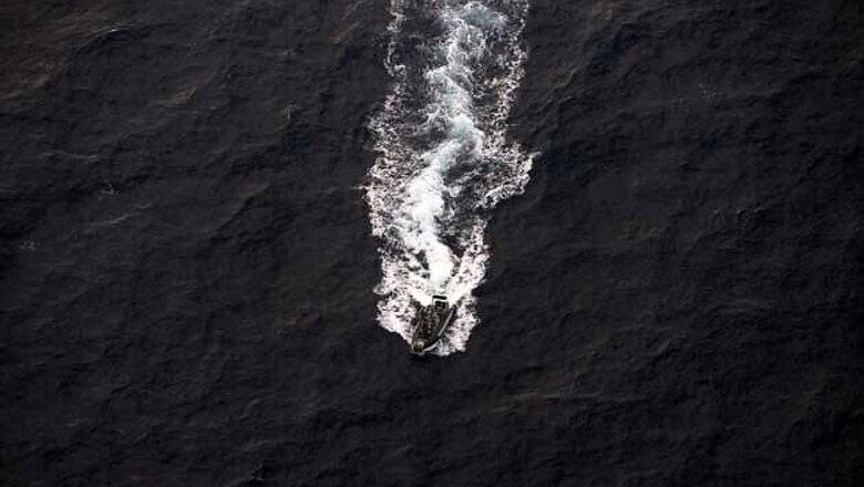 Boat with suspected Indonesia illegal workers sinks off Malaysia; at least 2 dead