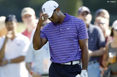 Woods recovers after car park fiasco