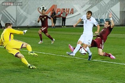 Two own goals help Russia sweep past Liechtenstein