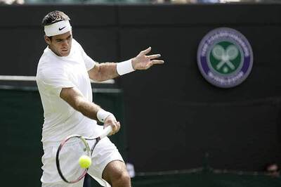 Del Potro advances to 2nd round at Wimbledon