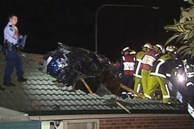 Car crashes into the roof of a house in Sydney