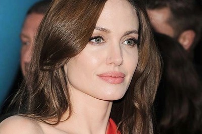 Angelina Jolie surprises Cinemacon to tout 'unbroken'