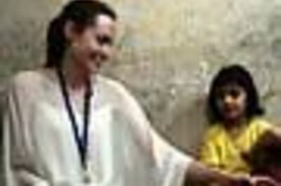Pics: Angelina, Brad meet Iraqi refugees in Syria