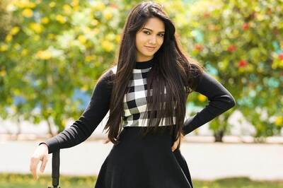 Actress Keerthi Krishna Is Elegance Personified In Black Sweater And Skirt